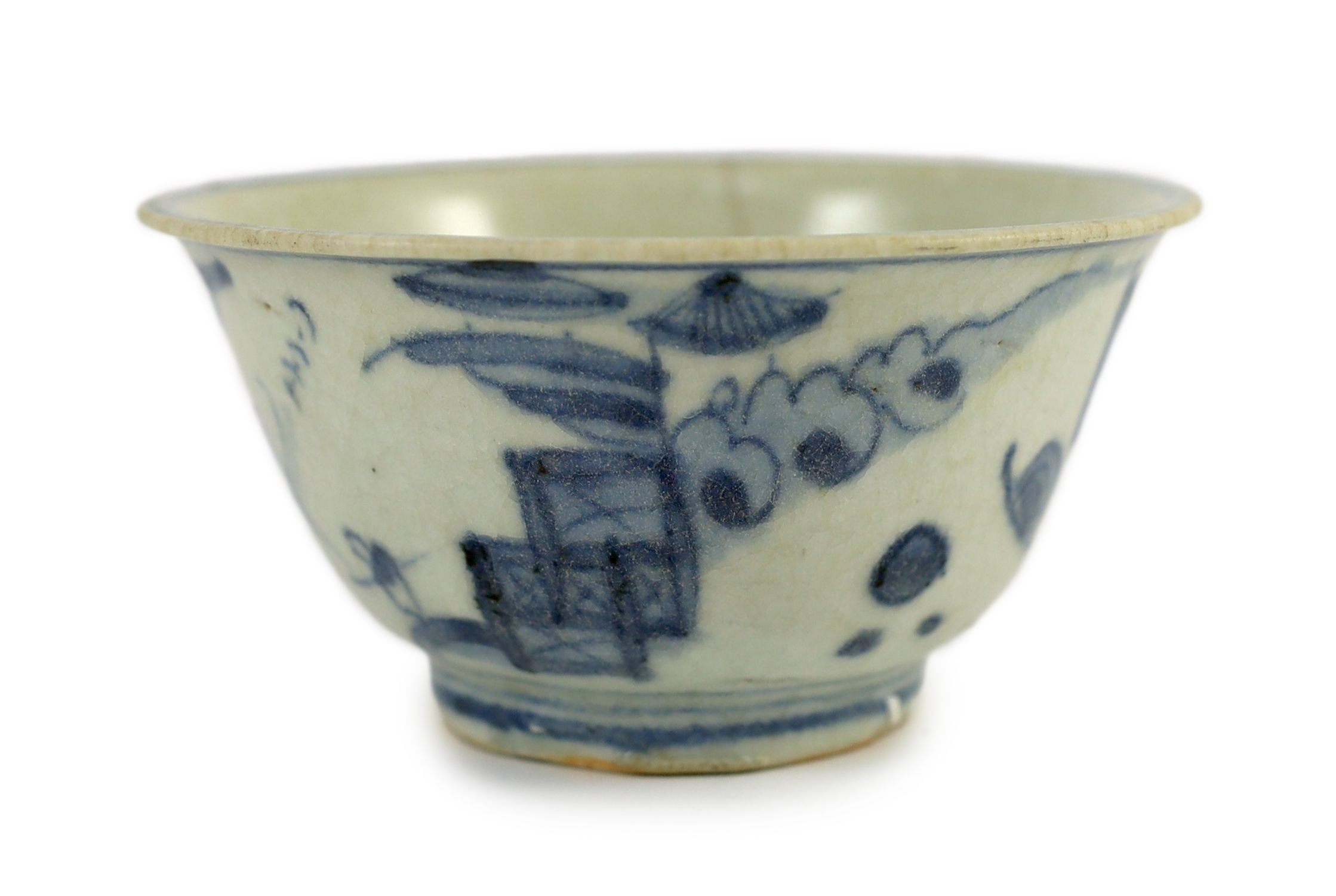 A Chinese Transitional inscribed blue and white bowl, mid 17th century, 12cm diameter, cracked